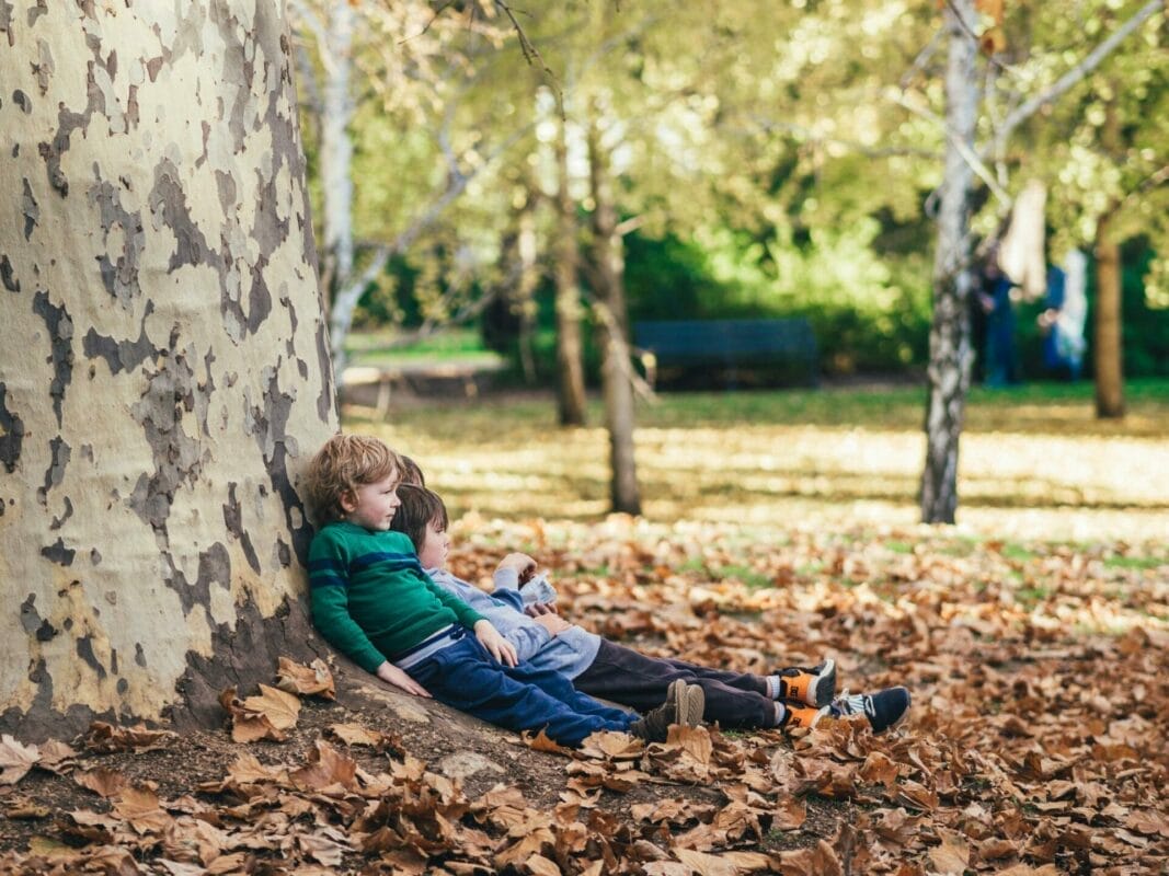 kids sat outside after playing